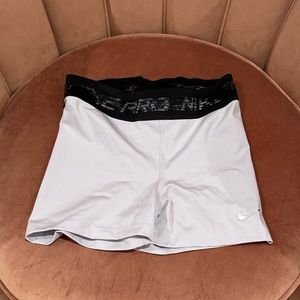 LILAC NIKE PRO RUNNING SHORTS